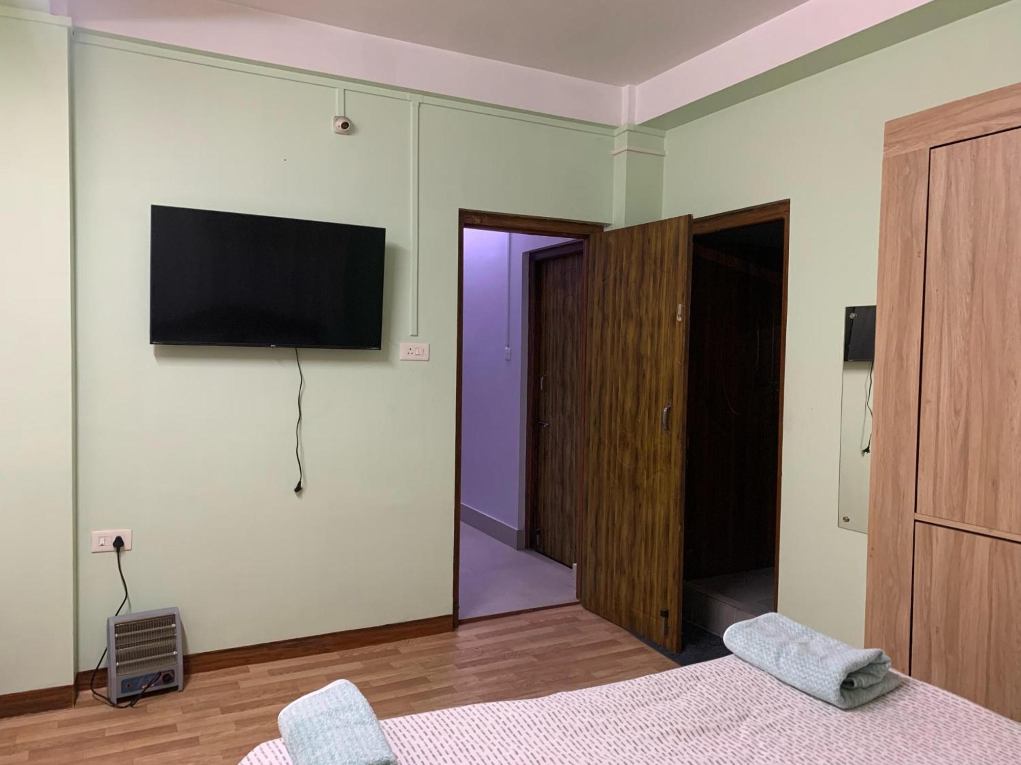 Cafe Sola Bnb Σιλόνγκ Δωμάτιο φωτογραφία